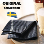 Spültücher Blau auf einem Tisch mit schwedischem Flaggen-Hintergrund und Produktinformationen.